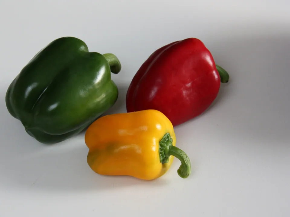 Green, yellow, and red sweet peppers